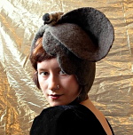 Handmade vintage style asymmetrical needle felted hat with chickadee bird perched ontop